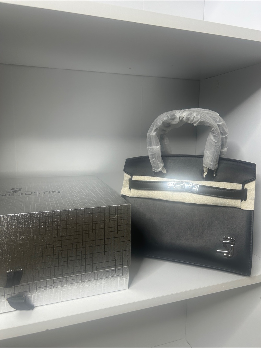 Elegant Black Mini Top-Handle Bag with Silver Hardware